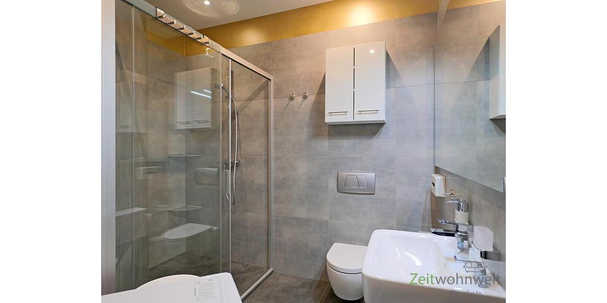 Bad mit bodentiefer Dusche